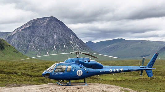 Airbus AS355F1 Twin Squirrel Helicopter with Buachaille Etive Mòr in the background, Scotland