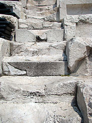 Foot-worn staircase of the Plovdiv Roman amphitheatre showing multiple repairs.