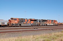 Diesel locomotives in BHP Billiton Iron Ore "bubble" livery, at the company's Nelson Point Yard, Port Hedland, Western Australia BHPB Iron Ore 4303 + 4346 (2).JPG