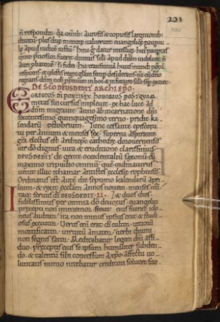 Une page de parchemin couverte de texte à l'encre noire, avec un titre à l'encre rouge au tiers supérieur indiquant le début de l'hagiographie