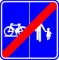 F101b: End of a road or part of a road reserved for pedestrians, cyclists horse riders and drivers of speed pedelecs with segregation