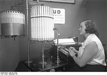 An early calculator shown at an office technology exhibition, Berlin, 1931. It was promoted as costing 3500 marks. Bundesarchiv Bild 102-12247, Berlin, Buroausstellung.jpg