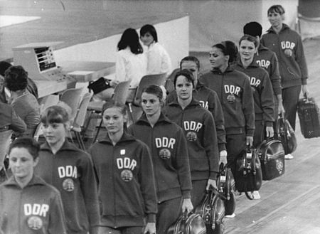 Irene Abel (5th from left, looking at the camera) with the East German team at the 1972 Olympics Bundesarchiv Bild 183-L0822-0026, XX. Olympiade, DDR-Turnerinnen, Training.jpg