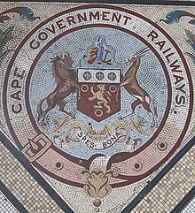 The crest of the now defunct Cape Government Rails as seen in the Cape Town central train station. Cape Government Railway crest.jpg