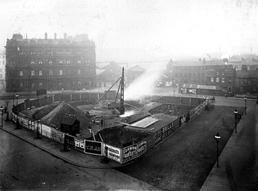 The original laying out of City Square in 1897. Behind is the original Queen's Hotel. City Square, original construction.jpg