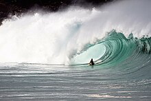 David "Dubb" Hubbard charging a large wave at Waimea Shorebreak David "Dubb" Hubbard at Waimea Shorebreak.jpeg