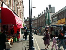 Electric Avenue, inspiration of the Eddy Grant single, part of Brixton Market, and site of the 1999 bombing Electric Avenue Market 01.JPG