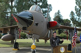 F-105D Thunderchief exhibit opening ceremony with speaker Maj. James Wahleithner F-105 ceremony.JPG