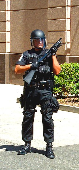 File:FPS officer in assault gear with shotgun.jpg