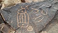 A petroglyph portrays multiple figures. Har Karkom ridge, Israel