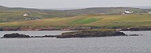 Forewick Holm from Sandness on Mainland Shetland with Papa Stour in the background