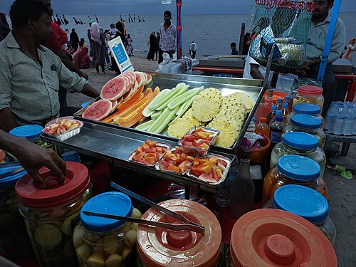 Fruit salad seller at Kozhikode Beach, Kerala