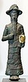Statuette d'une divinité, en cuivre entièrement couvert d'or à l'origine.