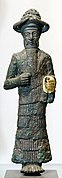 Statuette d'une divinité. Suse, début du IIe millénaire av. J.-C. Musée du Louvre.