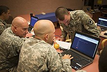 United States Cyber-guards during training in preparation for cyberwarfare. Guardsmen train for cyber war.jpg