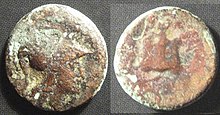 A bronze coin of Side, 350–300 BC: obverse, a Cortinthian-helmeted bust of Athena; reverse, a pomegranate fruit