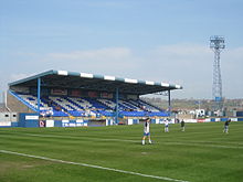 Holker Street, the home of Barrow A.F.C. Holkerstreetmainstand.jpg