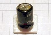 Capacitor with open vent