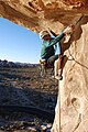 Climber on last pitch of North Overhang (5.9) on Intersection Rock at Hidden Valley Campground.}}