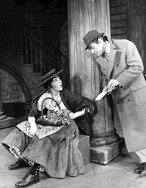 Julie Andrews as Eliza Doolittle meets Rex Harrison as Professor Henry Higgins in the 1956 musical adaptation of Pygmalion, My Fair Lady