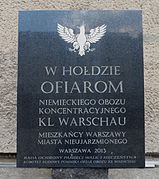 A commemorative plaque near Pawiak Prison (in Polish). It says: "In honour of the victims of the German concentration camp KL Warschau - inhabitants of Warsaw - the city that was never subdued. Warsaw 2013"