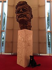 Bust of John F. Kennedy by Robert Berks located opposite the entrance to the Opera House in the Kennedy Center Kennedy Full Bust Performing Arts.jpg