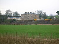 A view of the renovated Lainshaw House in 2007 from the Cunninghamhead road Lainshawhouse1.JPG