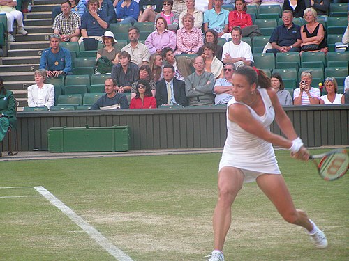 Davenport preparing to return a ball at the 2004 Wimbledon tournament