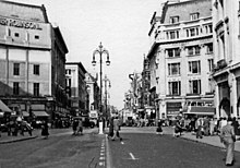 Oxford Circus in 1949 with temporary facade to the Peter Robinson building London Oxford Circus, 1949 geograph-3044387-by-Ben-Brooksbank.jpg