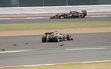 After colliding with each other on the opening lap, both Lotus drivers retired. Lotus accident Britain 2015.jpg