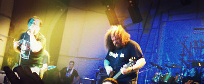 Napalm Death, a grindcore band shown here at a 2007 show, typically uses a heavy, grinding bass distortion tone. Nd1.jpg