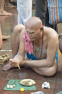 Pinda Daan is being done at the Jagannath Ghat, Kolkata.