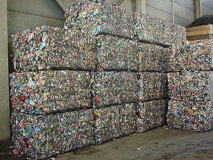 Aluminum cans pressed into blocks for recycling
