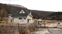 The Roane Iron Company furnace site at the end of Rockwood Street; the small building on the left is all that remains of the once vast iron works Roane-iron-works-site-tn1.jpg