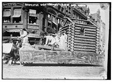 The "First Log Cabin" in the Centennial Parade Rochester Centennial - First Log Cabin.jpg