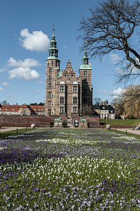 View of Rosenborg Castle across a carpet of crocuses on the lawn in the King's Garden. Photographer: Plasticpeer