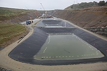 Image shows storage of runoff waste water in treatment ponds Runoff water treatment ponds (6851975088).jpg