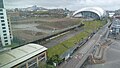 Sage development site between Glasshouse concert halls and Baltic art centre, as seen from the Baltic in 2024.