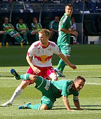 Lindgren looks on as Steffen Hofmann is fouled during a match between Rapid Wien and Red Bull Salzburg. Salzburg Rapid.jpg