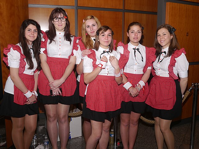 Waitresses at a maid café in Toulon, France