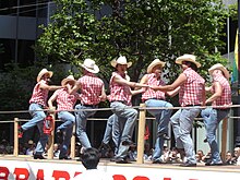 Dancers performing group routines on a pride parade float in the 2006 San Francisco Pride parade. Sf2006pride-10.jpg