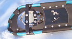 Underside of a modern fixed-rotation binding snowshoe, showing cleats for traction on steep slopes Snowshoe reverse.jpg