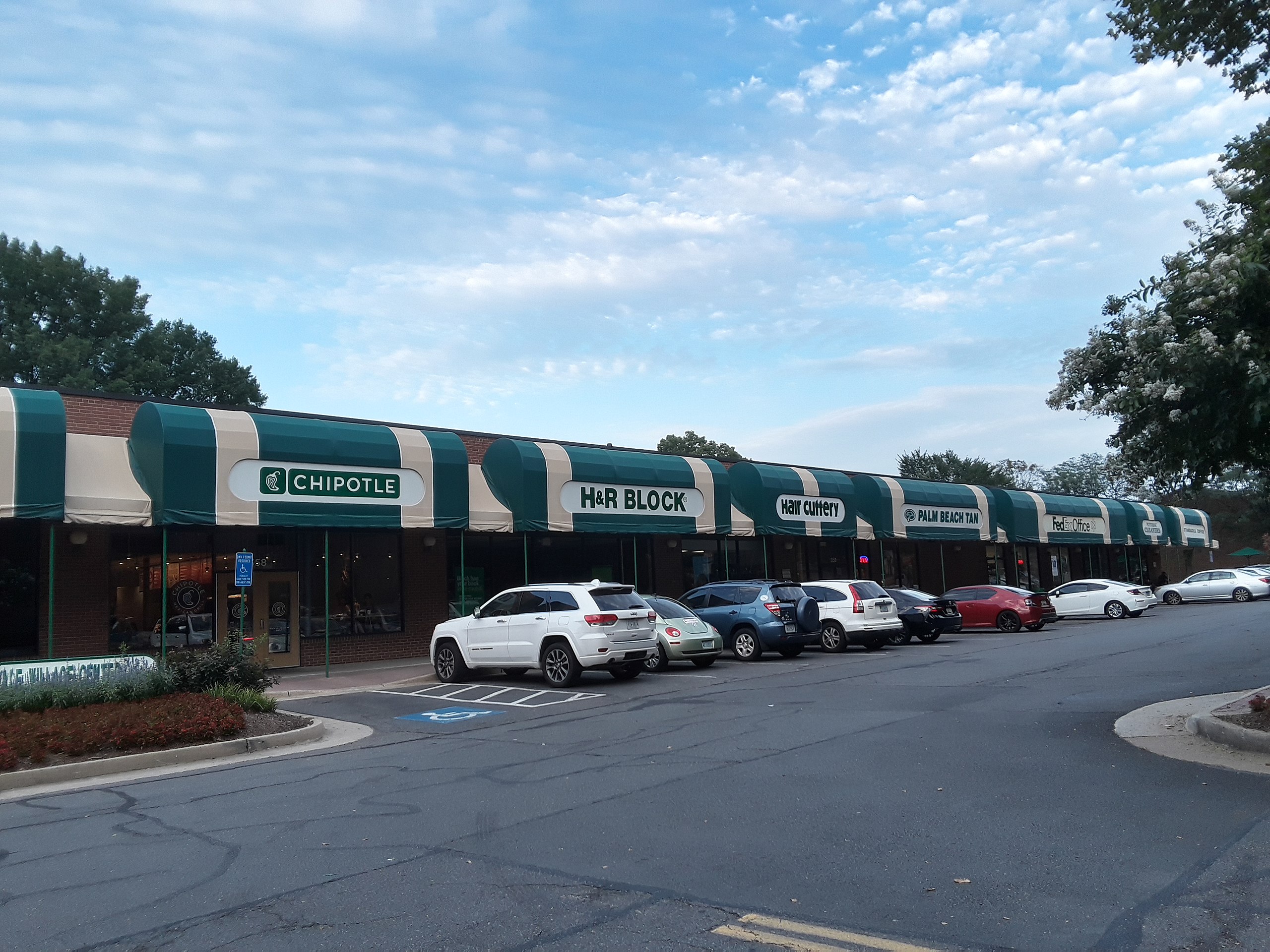 File:Strip mall storefronts in Falls Church.jpg - Wikimedia Commons