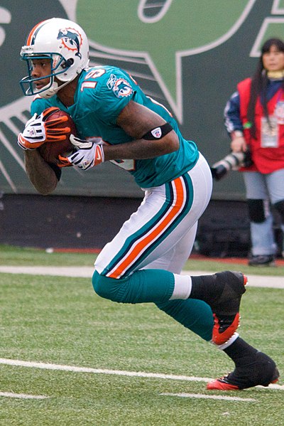 Ginn playing against the Jets in 2009.