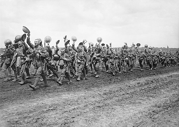 Men of the 4th Battalion, Worcestershire Regiment marching to the trenches; Acheux-en-Amiénois, France, 27 June 1916.