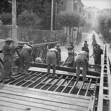 RE sappers complete a Bailey bridge to replace one blown by retreating Germans, Italy, September 1943. The British Army in Italy 1943 NA7082.jpg