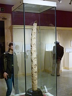 Ivory carved tusk depicting Buddha life stories Ivory carved Buddha statue in India