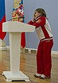 Russian gymnast Viktoria Komova wearing a tracksuit
