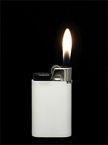 An ignited lighter White lighter with flame.JPG