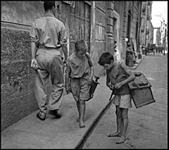 “Children In Naples, Italy”. Little boys at work. Photographed by Lieutenant Wayne Miller, July 1944. U.S. Navy Photograph, now in the collections of the National Archives.jpg